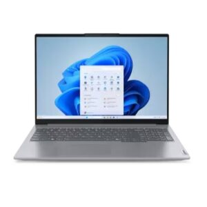 JFM Technology Silver laptop open displaying the Windows desktop with a floating application window on screen