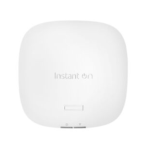 Close up of a white rounded electronic device with an embossed Instant On label and a small rectangular control area at the bottom portion of the device