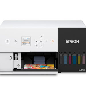 White epson printer with color ink cartridges visible on the right and a photo being printed in the tray
