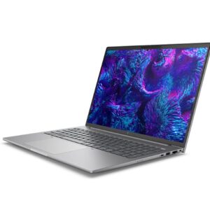 Slim silver laptop open at a slight angle displaying a vibrant purple and blue abstract wallpaper on the screen