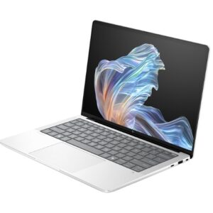 Silver laptop open at a slight angle showing a colorful abstract wallpaper on a dark screen with a gray keyboard and spacious trackpad