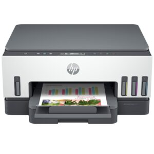 JFM Technology Hp printer seen from front with paper output tray showing color documents being printed on white background