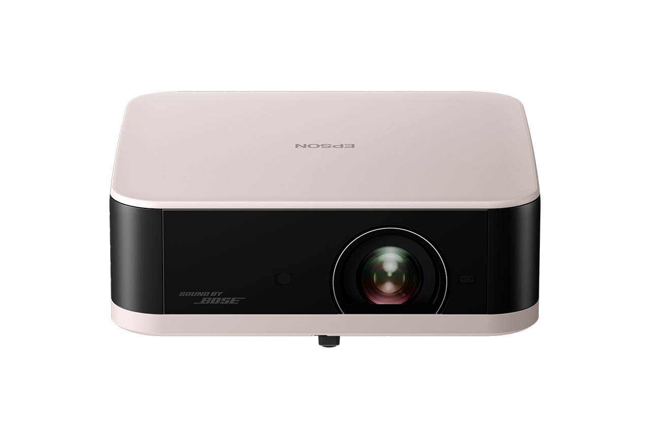 JFM Technology Front view of a beige epson projector with a large central lens and black front panel