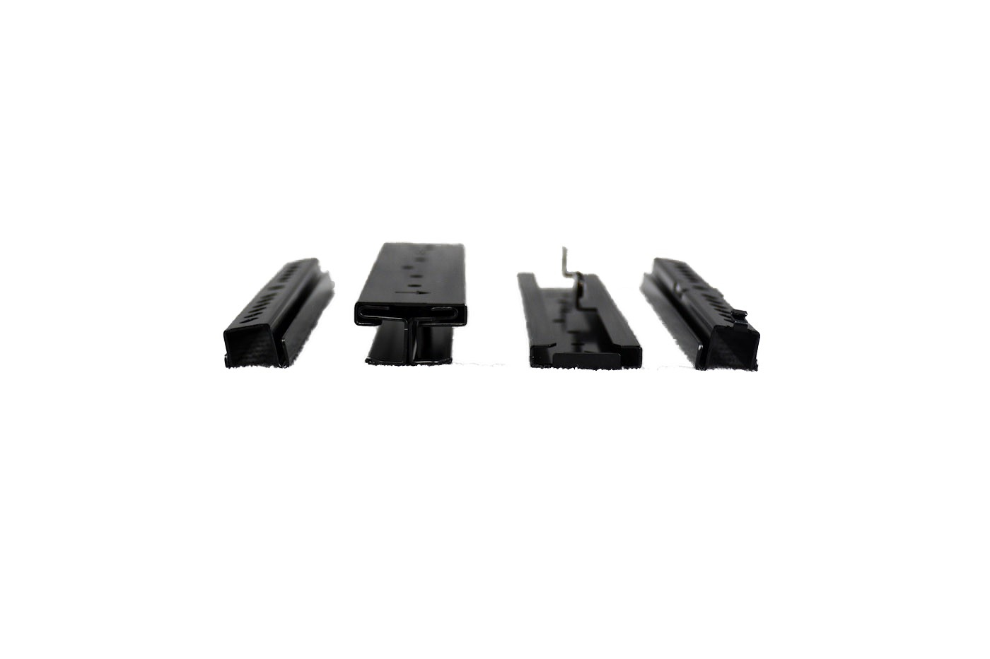 JFM Technology Four black computer expansion cards laid in a row on a white surface viewed from the sideedge